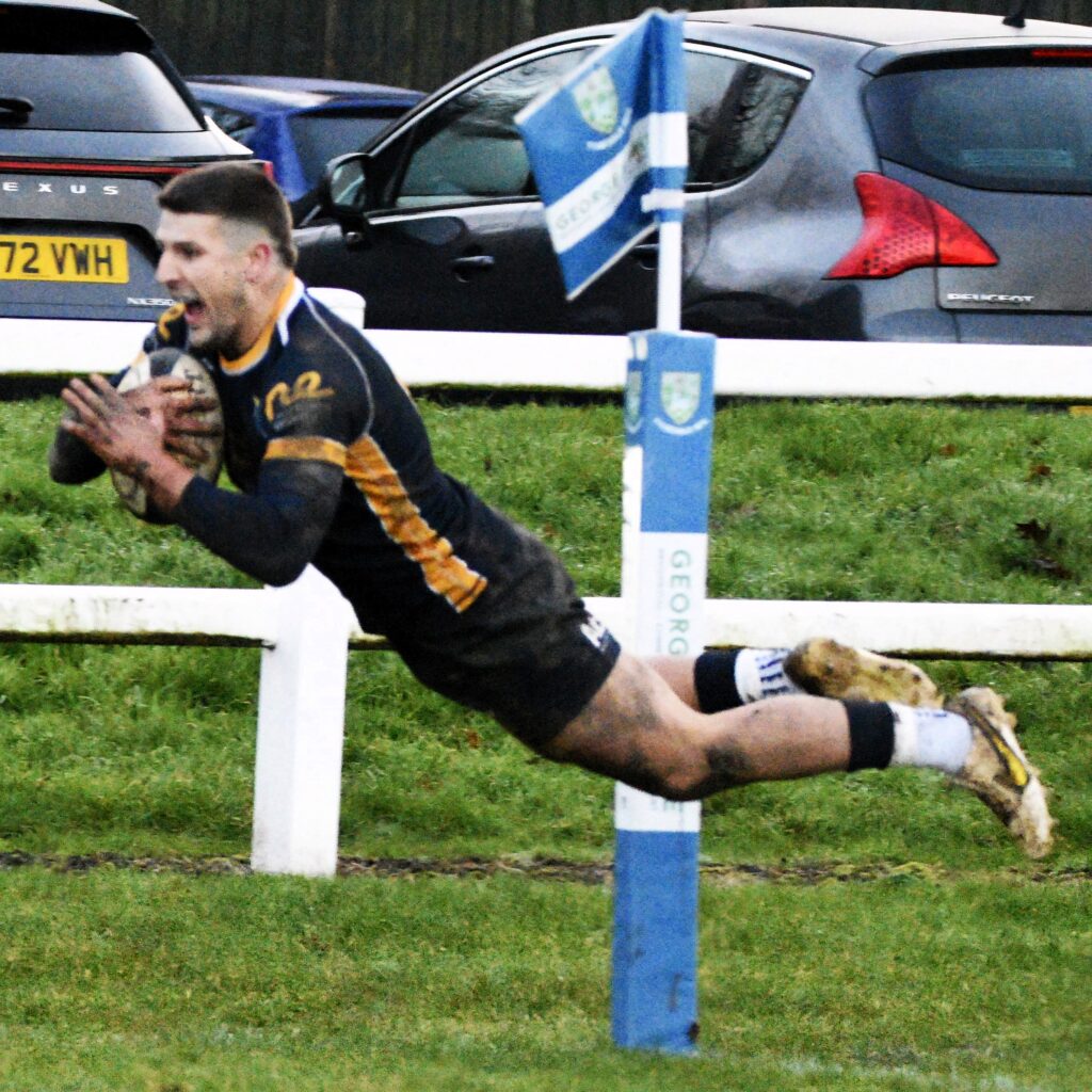 Charlie Venables scoring.