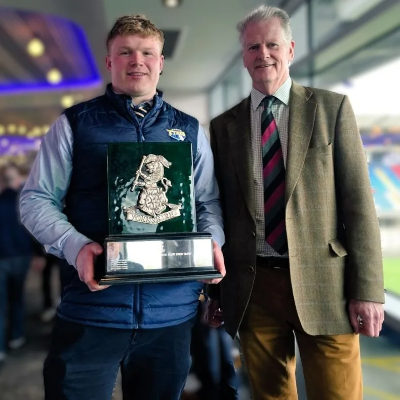 Leeds Tykes captain, Adam Brown, with the Yorkshire Regiment Trophy - 2023/24 season winners