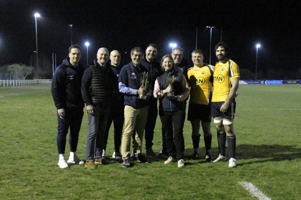 The Titan Wealth team with Alastair Da Costa, Chair of Leeds Tykes, coaches and 2 players