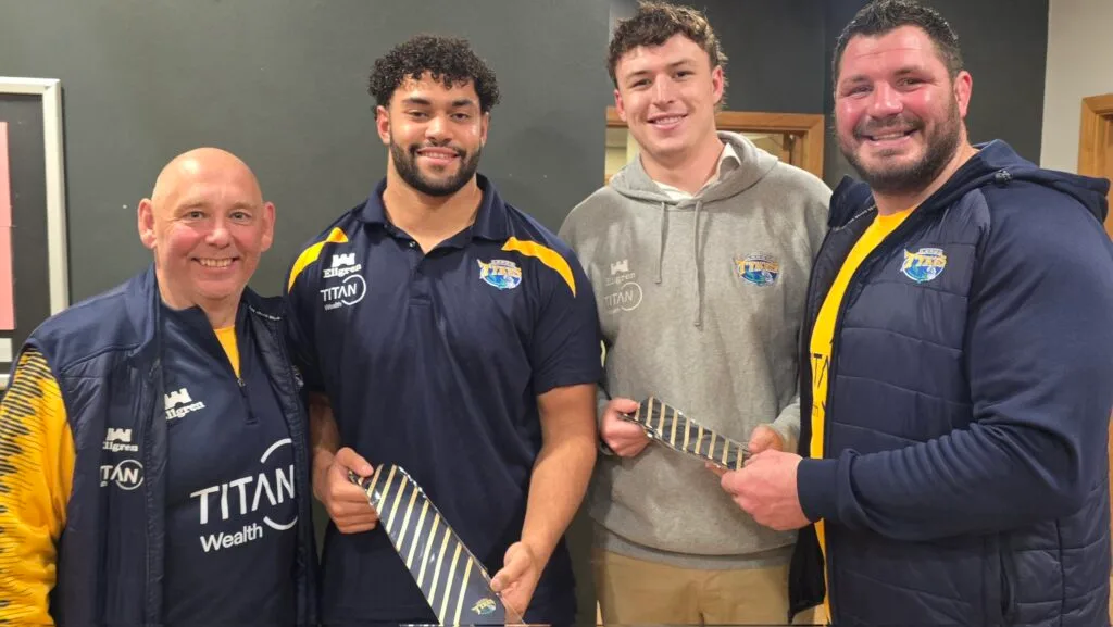 Tye Raymont and Seth Eley receiving their club ties on their debuts, presented by DoR Pete Seabourne and Forwards Coach James Philips