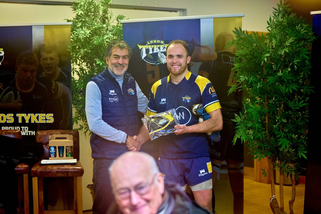 Ben Dixon being presetned with his Leeds Tykes cap for 100 appearences for the club. Presented by Alistair de Costa, Leeds Tykes' hair