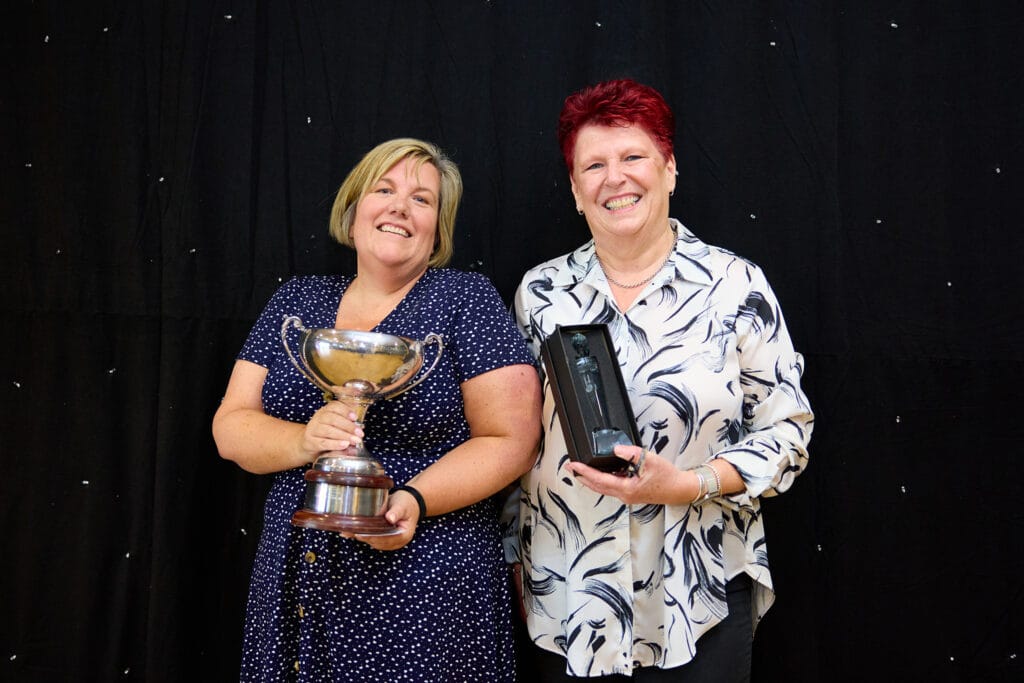 Susie Woffinden and Angela Rimmington Brown with Eddie's trophies