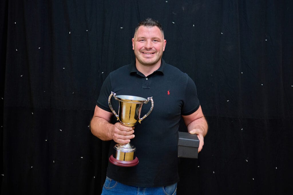 James Phillips with Alex's trophies