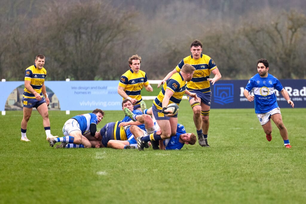 Will Dennis with the ball Seth Eley, Kit Keith and Charlie Venables in the background